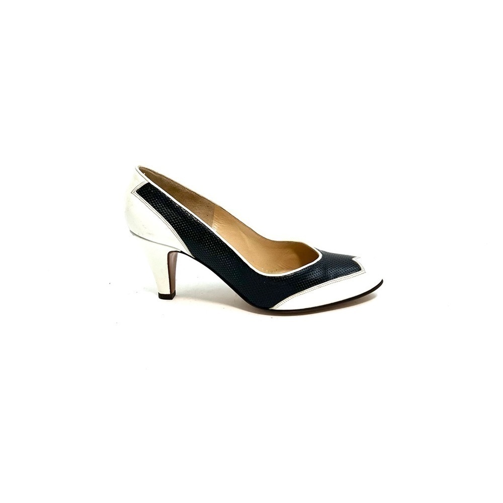Vintage 1960s navy blue and white leather wingtip slip on pumps